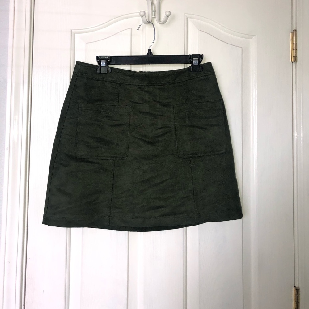 Dark green mini skirt
